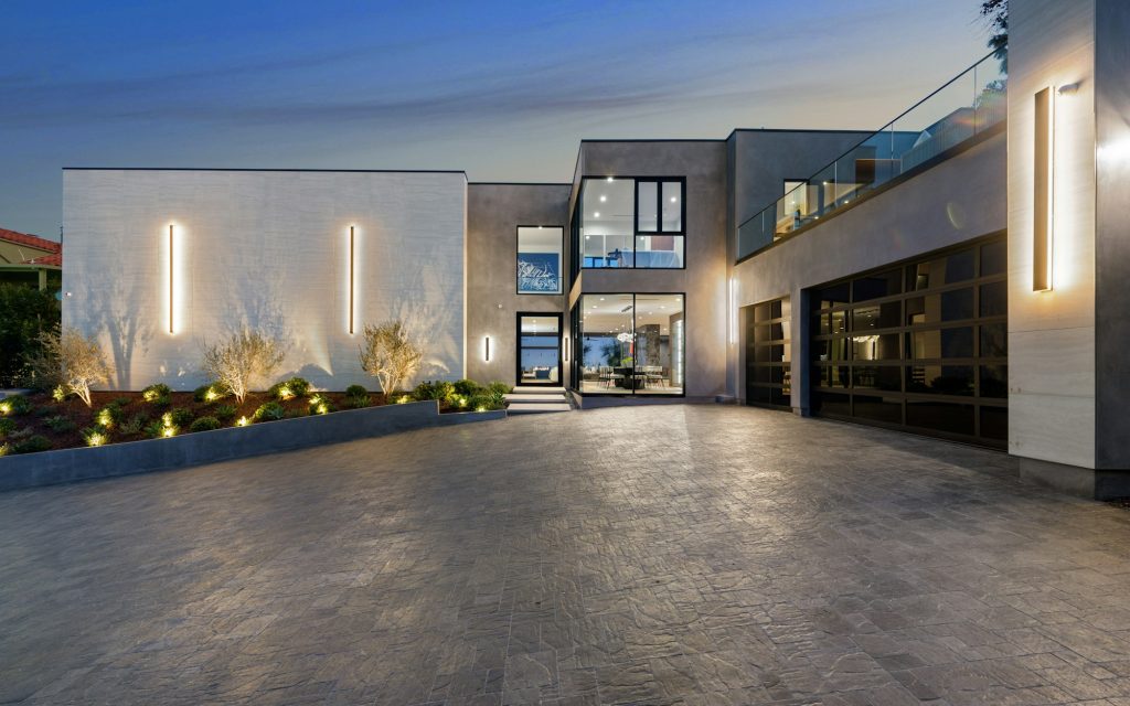 Home with landscaped concrete driveway, New Construction Home in Tarzana, California